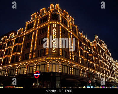Harrods Department Store at night showing London Underground sign,  Knightsbridge, Royal Borough of Kensington and Chelsea Stock Photo
