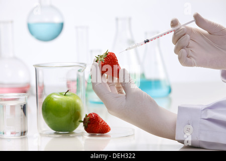 Asian people engaging in nurturing research Stock Photo