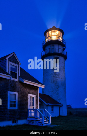 Ligthouse casts guiding light into dark blue night, Truro, Cape Cod, Massachusetts, USA Stock Photo