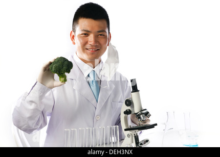 Asian people engaging in nurturing research Stock Photo