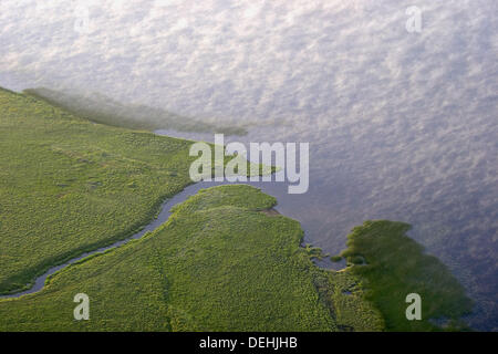 Lake And Clouds In Morning Light, Sweden by Roine Magnusson