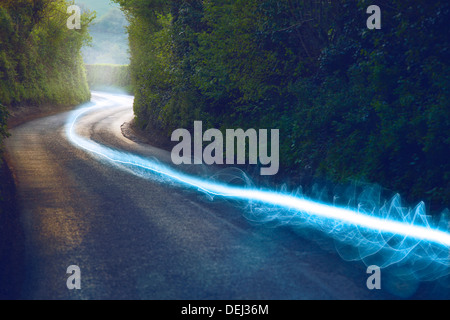 Fiber optic cable running above ground the British Countryside Stock Photo