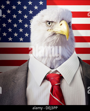 Head an eagle on a businessman's body front American Stars Stripes flag Stock Photo