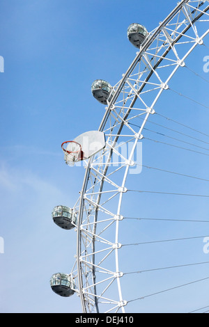 Large Ferris Wheel with a large basketball board hoop attached Stock Photo
