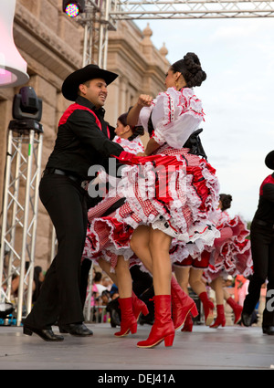 Mexican Independence day celebration at the Texas Capitol building in Austin includes traditional dances with colorful costumes Stock Photo