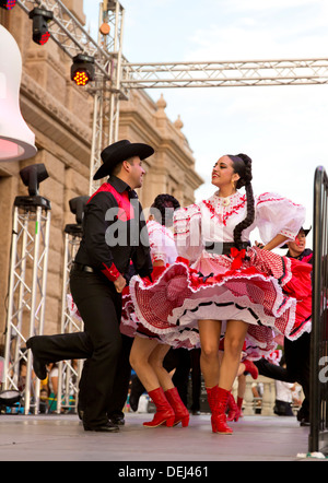 Mexican Independence day celebration at the Texas Capitol building in Austin includes traditional dances with colorful costumes Stock Photo