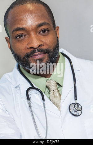 African American man male hospital doctor in white coat with stethoscope Stock Photo
