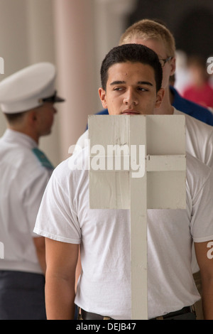 Incoming Citadel freshman known as knobs line up watched by upperclassmen during matriculation day on August 17, 2013 in Charleston, South Carolina. The Citadel is a state military college that began in 1843. Stock Photo