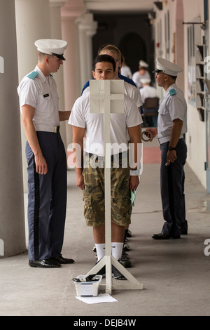 Incoming Citadel freshman known as knobs line up watched by upperclassmen during matriculation day on August 17, 2013 in Charleston, South Carolina. The Citadel is a state military college that began in 1843. Stock Photo