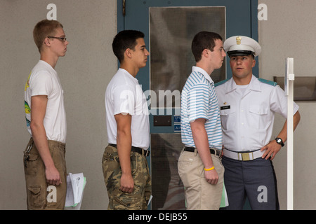 Incoming Citadel freshman known as knobs line up watched by upperclassmen during matriculation day on August 17, 2013 in Charleston, South Carolina. The Citadel is a state military college that began in 1843. Stock Photo