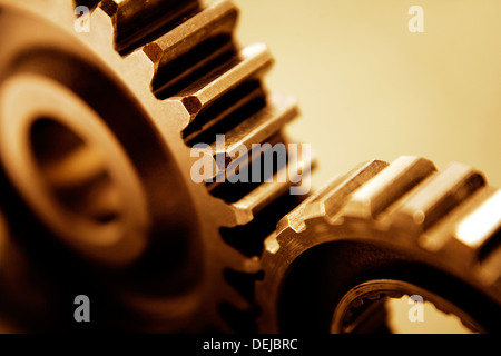 Closeup of two metal cog gears Stock Photo