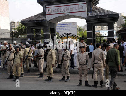 Cairo, Cairo, Egypt. 19th Sep, 2013. Egyptian security forces stand guard in front of the al-Zamalek football club's headquarters in Cairo on Sept. 19, 2013. Members of a hardcore group of fans of the Zamalek football club, the Ultra White Knights (UWK), stormed the club's headquarters in Cairo on Thursday following a protest demanding changes to the club's leadership Credit:  Ahmed Asad/APA Images/ZUMAPRESS.com/Alamy Live News Stock Photo