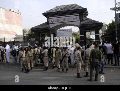 Cairo, Cairo, Egypt. 19th Sep, 2013. Egyptian security forces stand guard in front of the al-Zamalek football club's headquarters in Cairo on Sept. 19, 2013. Members of a hardcore group of fans of the Zamalek football club, the Ultra White Knights (UWK), stormed the club's headquarters in Cairo on Thursday following a protest demanding changes to the club's leadership Credit:  Ahmed Asad/APA Images/ZUMAPRESS.com/Alamy Live News Stock Photo