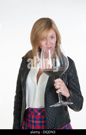 Woman Holding Very Large Glass Of Red Wine Stock Photo, Picture