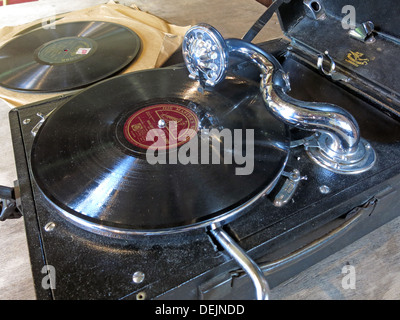 Portable Wind Up Gramophone Record Player with 78rpm Vinyl record, England, UK Stock Photo