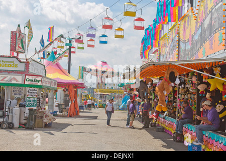 Carnival games, Barkers, food, and colorful rides at the North Carolina Mountain State Fair Stock Photo