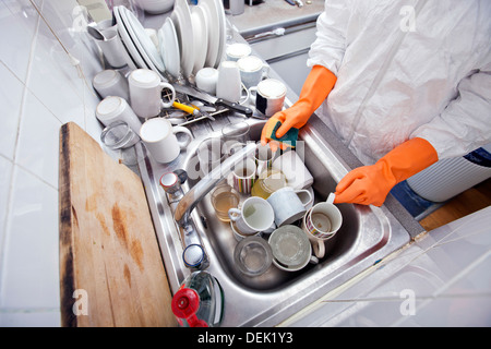 Midsection woman washing utensil kitchen sink Stock Photo