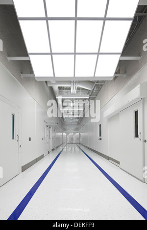 Blue stripes on jail corridor Stock Photo