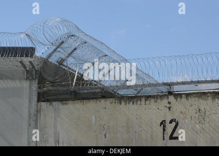 Ravensburg, Germany. 19th Sep, 2013. Several rolls of barb wire lie at the wall of the prison in Ravensburg, Germany, 19 September 2013. Photo: Felix Kaestle/dpa/Alamy Live News Stock Photo