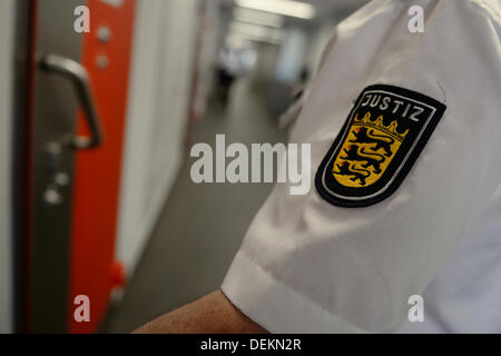 Ravensburg, Germany. 19th Sep, 2013. An employee of the prison unlocks a door in the new build of the prison in Ravensburg, Germany, 19 September 2013. Photo: Felix Kaestle/dpa/Alamy Live News Stock Photo