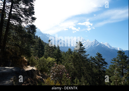 The view looks back south towards Namche Bazaar from the hiking trail leading towards Thame, Solokhumbu/Everest Region, Nepal Stock Photo