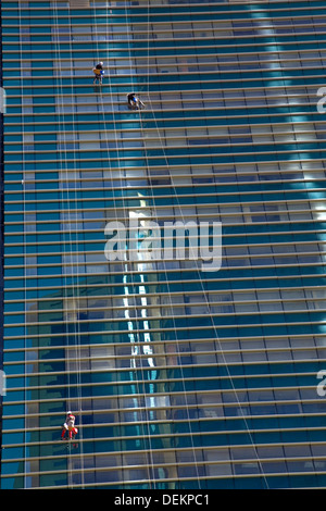 Cleaning skyscrapers in Astana, Kazakhstan Stock Photo