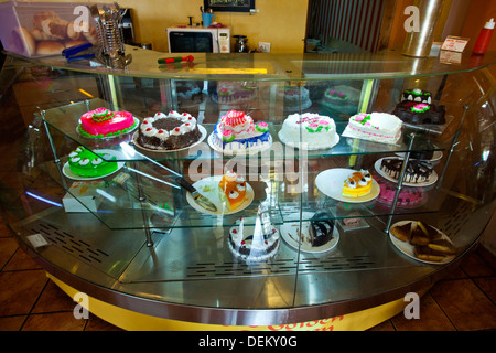 Cakes and pastries in the display cabinet at bakery shop, Golden Oven Cake Shop, Mapusa, North Goa, Goa, India Stock Photo
