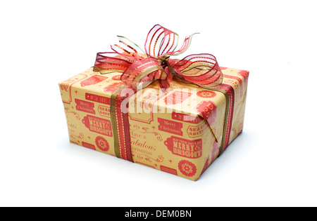 A wrapped Christmas present with a colourful ribbon bow on a white background. Stock Photo