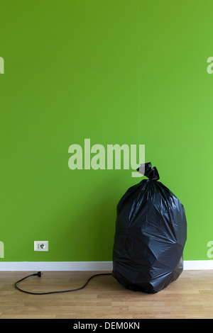 https://l450v.alamy.com/450v/dem0kn/garbage-bag-with-plug-and-outlet-dem0kn.jpg