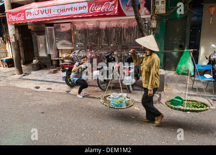 vendor and photographer in Hanoi, Vietnam Stock Photo