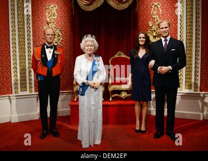 The wax figures of Prince Philip, Duke of Edinburgh (L-R), Queen Elizabeth II, Catherine, Duchess of Cambridge, and Prince William, Duke of Cambridge stand in Madame Tussauds in London, Great Britain, 15 September 2013. Photo: JENS KALAENE Stock Photo