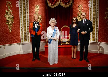 The wax figures of Prince Philip, Duke of Edinburgh (L-R), Queen Elizabeth II, Catherine, Duchess of Cambridge, and Prince William, Duke of Cambridge stand in Madame Tussauds in London, Great Britain, 15 September 2013. Photo: JENS KALAENE Stock Photo