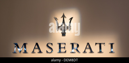 FRANKFURT - SEPT 16: Maserati text and emblem on the wall at the 65th IAA (Internationale Automobil Ausstellung) Stock Photo