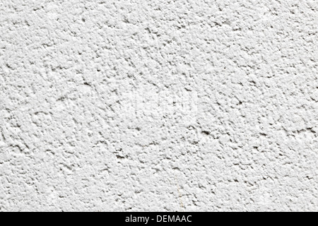 Background detail of white textured concrete wall surface Stock Photo