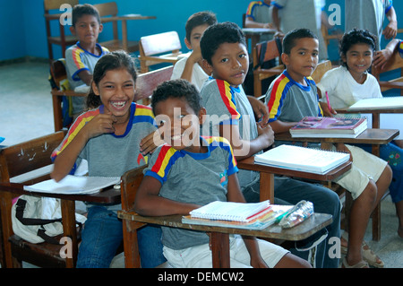 Smiling school children in a class room at the school in Moura, Amazonia, Brazil Stock Photo