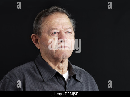 Sad, depressed or deep in thoughts senior old man Stock Photo