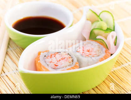 Tasty sushi with soy sauce on the table, california roll, traditional japanese cuisine, luxury meal, healthy food
