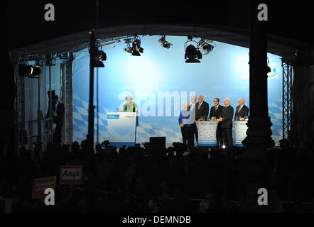 Munich, Germany. 20th Sep, 2013. Chancellor Angela Merkel (L) of the Christian Democratic Party (CDU) speaks during an election campaign event in Munich, Germany, 20 September 2013. Next to her (L-R): Head of the state group of the CDU Gerda Hassefeldt, Minister of Transport Peter Ramsauer (CSU), Bavarian First Minister and president of the CSU Horst Seehofer, the general secretary Alexander Dobrindt, the former bavarian First Minister Edmund Stoiber (CSU) and Hans-Peter Uhl (CSU) on the stage in Munich, Germany, 20 September 2013. Photo: Andreas Gebert/dpa/Alamy Live News Stock Photo