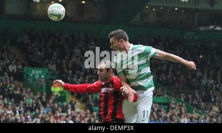 Glasgow, Scotland. 21st Sep, 2013. Derk Boerrigter wins an aerial duel with David MacKay during the Scottish Premier League game between Celtic and St Johnstone from Parkhead. Credit:  Action Plus Sports/Alamy Live News Stock Photo