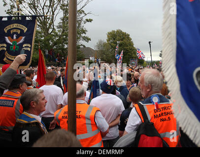 Belfast, Northern Ireland, UK. 21st Sep, 2013.   Loyalist Protesters parade to the Woodvale Road in North Belfast in protest of the parades commission ruling on the route of parades following the 12th of July rioting in the city - Credit:  Kevin Scott/Alamy Live News Stock Photo