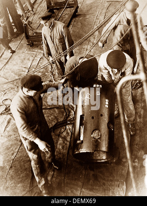 Royal Navy sailors with a torpedo Stock Photo - Alamy