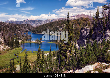 Afternoon clouds build over Moccasin Lake and the Wallowa Mountains in NE Oregon's Eagle Cap Wilderness Area. Stock Photo