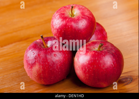 ripe red apples dewed in pile Stock Photo