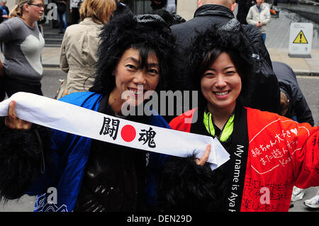 London, UK. 21st Sep, 2013. The Great Gorilla Run takes place in London, UK. Now in its 10th year, the event has raised more than £1.9 million for biodiversity conservation and poverty reduction projects in central Africa. Since the first Great Gorilla Run in 2003, thousands of people have donned their gorilla suits and joined the 7k fun run route starting at Mincing Court in the City and passing some of London's most iconic landmarks, including the Tower of London and St Paul's Cathedral. Credit:  See Li/Alamy Live News Stock Photo