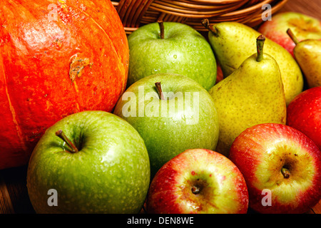 Harvest of ripe fruits and vegetables: apples, pears and pumpkin Stock Photo