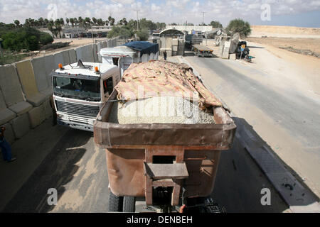 Sept. 22, 2013 - Rafah, Gaza Strip, Palestinian Territory - A Palestinian truck carries cement supplies after upon arrival to the town of Rafah through the Kerem Shalom crossing between Israel and the southern Gaza September 22, 2013. Israel began allowing construction material for private projects into the Gaza Strip on Sunday for the first time in six years, in response to a request from Palestinian President Mahmoud Abbas, an Israeli defence official said  (Credit Image: © Eyad Al Baba/APA Images/ZUMAPRESS.com) Stock Photo