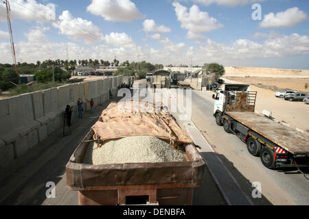 Sept. 22, 2013 - Rafah, Gaza Strip, Palestinian Territory - A Palestinian truck carries cement supplies after upon arrival to the town of Rafah through the Kerem Shalom crossing between Israel and the southern Gaza September 22, 2013. Israel began allowing construction material for private projects into the Gaza Strip on Sunday for the first time in six years, in response to a request from Palestinian President Mahmoud Abbas, an Israeli defence official said  (Credit Image: © Eyad Al Baba/APA Images/ZUMAPRESS.com) Stock Photo