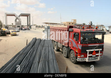 Sept. 22, 2013 - Rafah, Gaza Strip, Palestinian Territory - A Palestinian truck carries cement supplies after upon arrival to the town of Rafah through the Kerem Shalom crossing between Israel and the southern Gaza September 22, 2013. Israel began allowing construction material for private projects into the Gaza Strip on Sunday for the first time in six years, in response to a request from Palestinian President Mahmoud Abbas, an Israeli defence official said  (Credit Image: © Eyad Al Baba/APA Images/ZUMAPRESS.com) Stock Photo