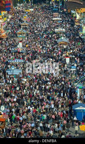Munich, Germany. 21st Sep, 2013. Numerous people visit the 180th Oktoberfest in Munich, Germany, 21 Septmebr 2013. The Oktoberfest is held from 21 September to 06 October 2013. Photo: MARC MUELLER Stock Photo