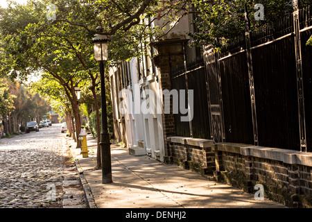 Historic cobble stone Chalmers Street in Charleston, SC. Stock Photo